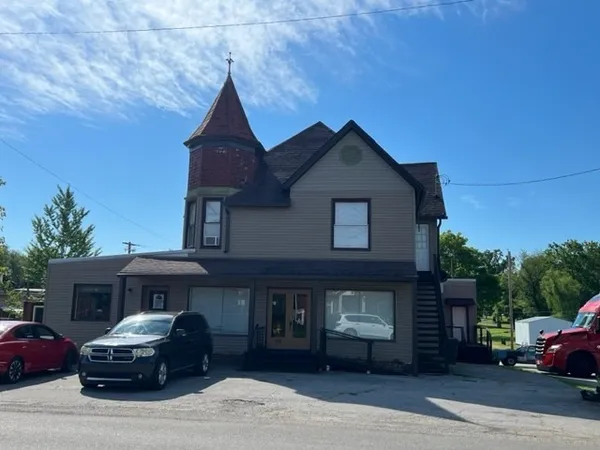 a car parked in front of a house