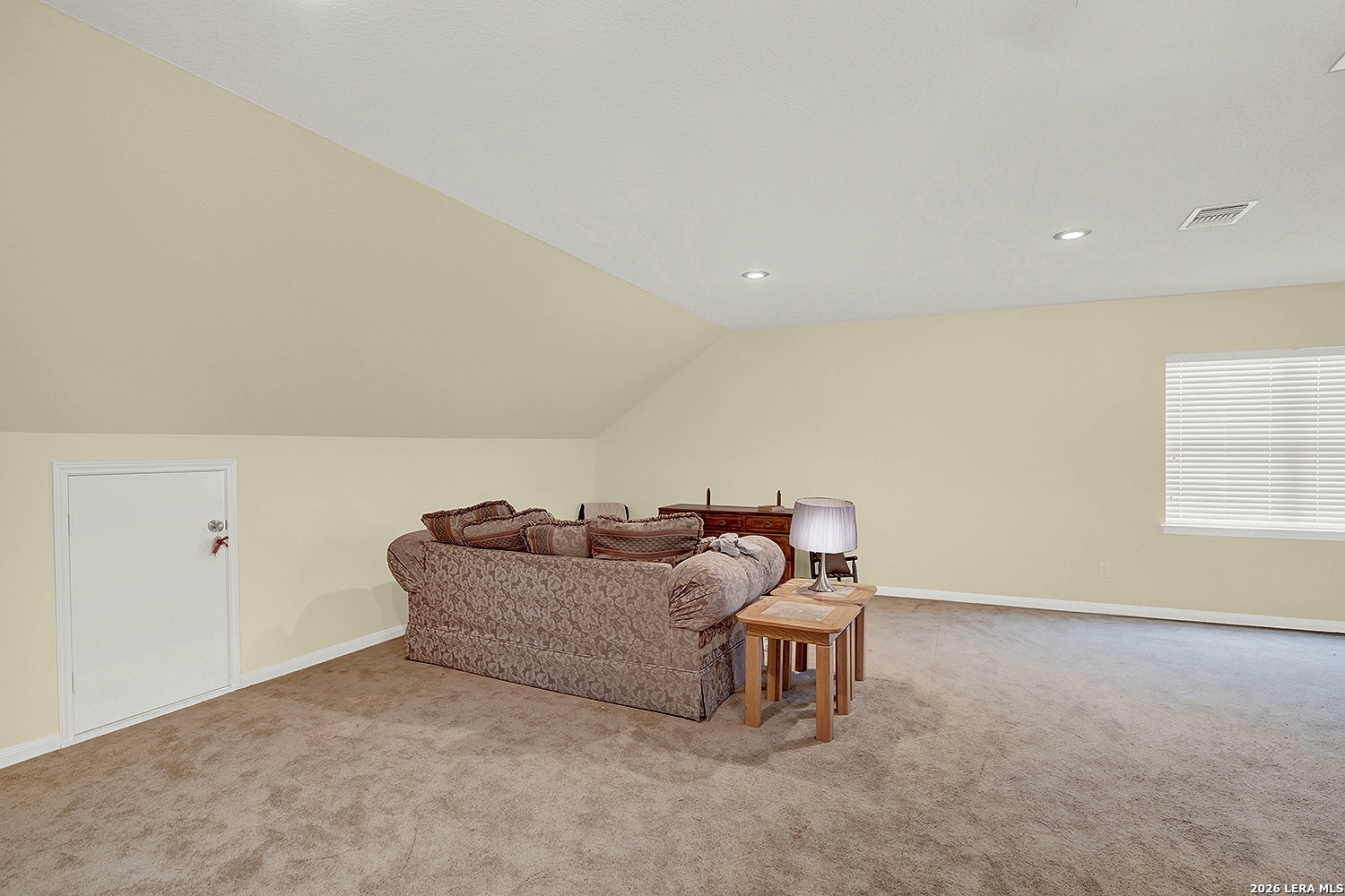 3283 Hartfield Road La Vernia, TX 78121 - Photo 31 of 40 a living room with furniture and a window