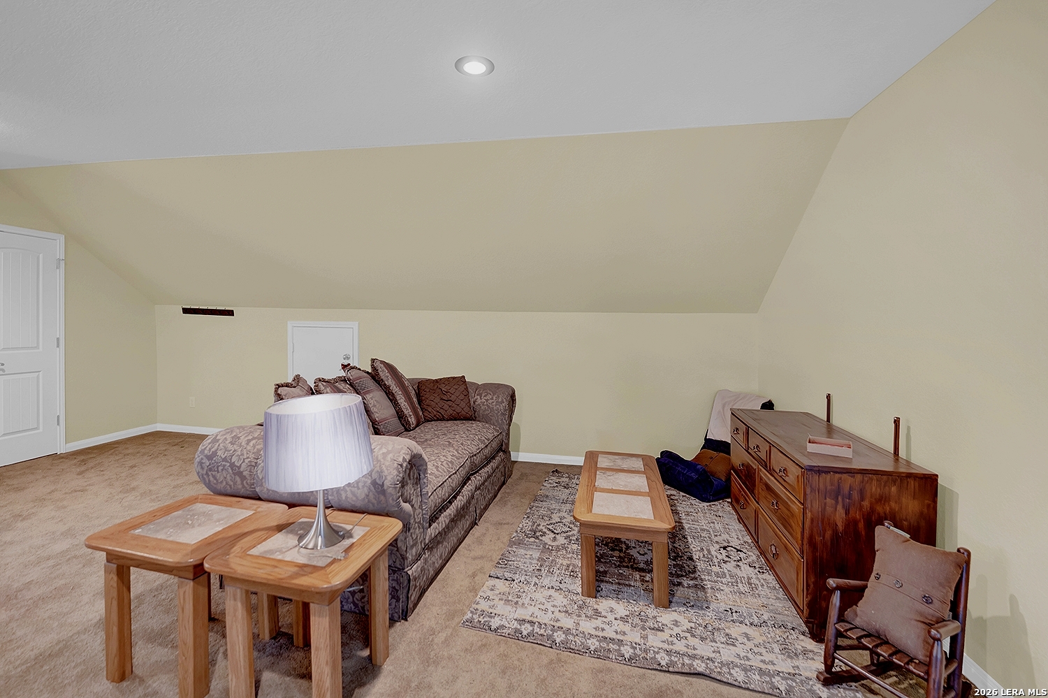 3283 Hartfield Road La Vernia, TX 78121 - Photo 33 of 40 a living room with furniture and a couch