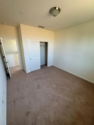 a view of a room with an empty space