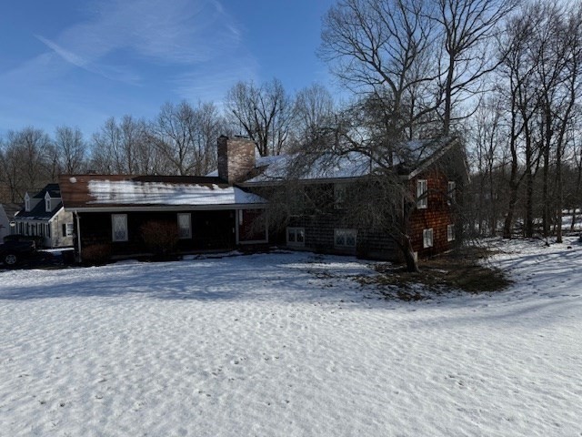 1 Bruce Street Avon, MA 02322 - Photo 20 of 23 a view of a yard with plants