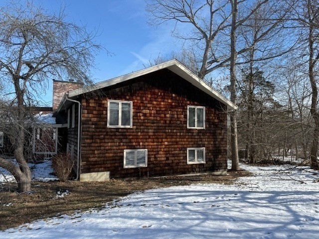 1 Bruce Street Avon, MA 02322 - Photo 23 of 23 a front view of a house with a yard