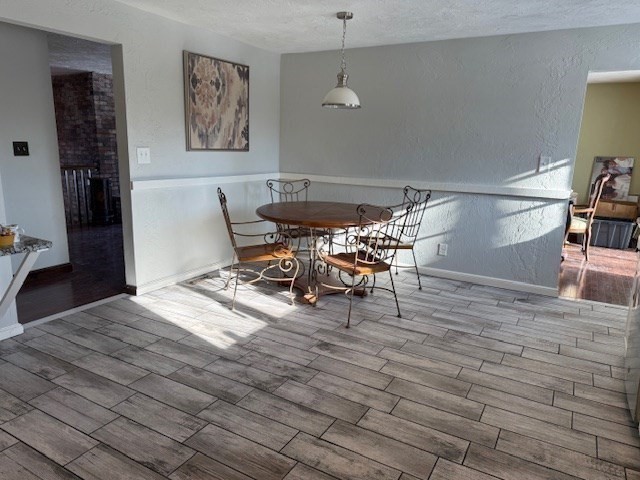 1 Bruce Street Avon, MA 02322 - Photo 4 of 23 a view of a dining room with furniture and wooden floor