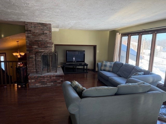 1 Bruce Street Avon, MA 02322 - Photo 7 of 23 a living room with furniture and a fireplace