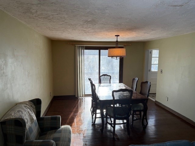 1 Bruce Street Avon, MA 02322 - Photo 8 of 23 a view of a dining room with furniture window and wooden floor