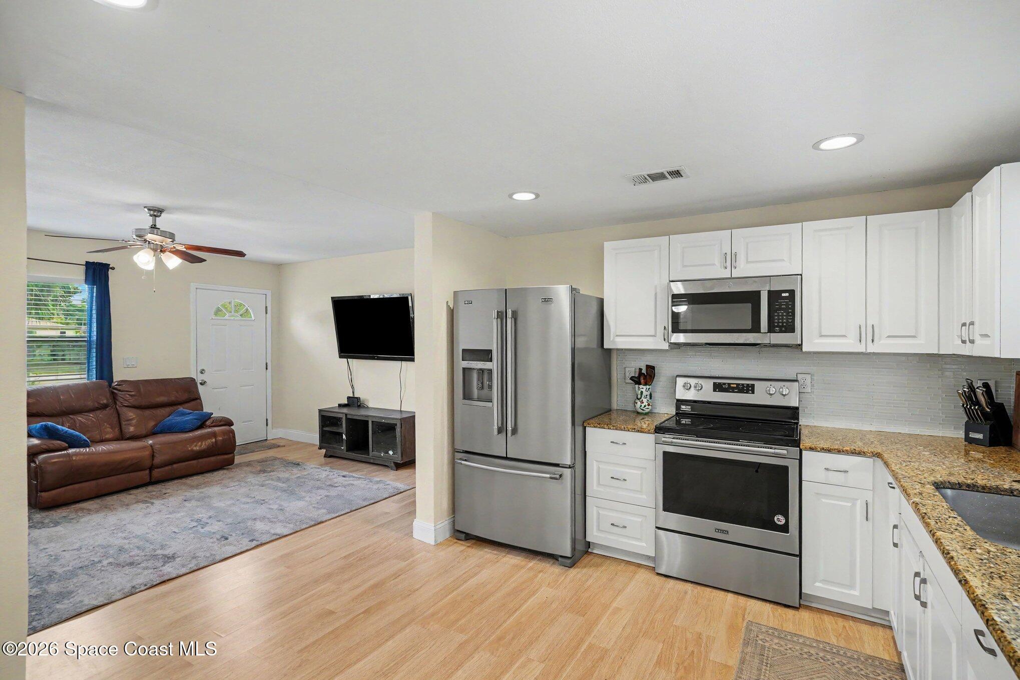 2556 1st Avenue Northeast Palm Bay, FL 32905 - Photo 6 of 27 010_file_3649