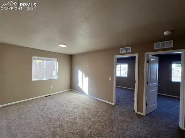 an empty room with closet