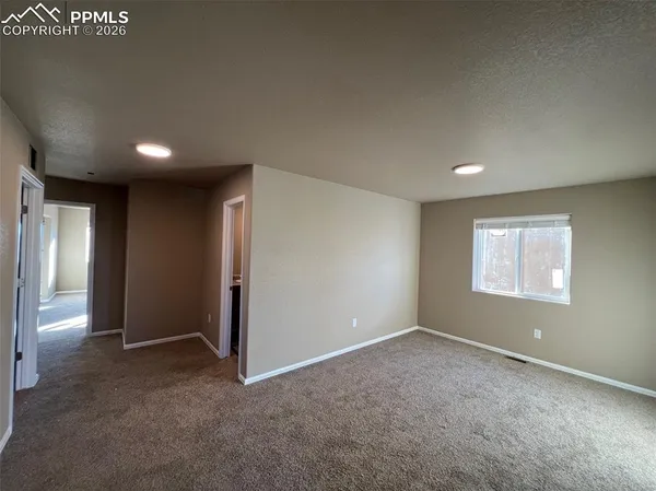 an empty room with a window