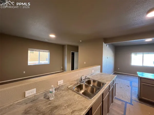 a view of an empty walk in closet
