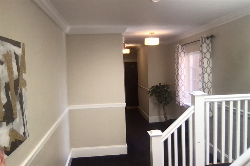 21 Fruit Street Worcester, MA 01609 - Photo 7 of 7 a bathroom with a bathtub and a shower