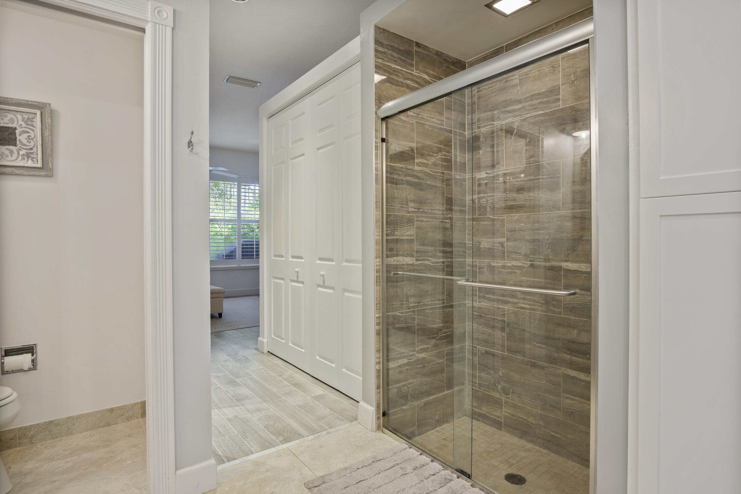 4974 Southeast Inkwood Way Hobe Sound, FL 33455 - Photo 20 of 35 9D Primary Bathroom
