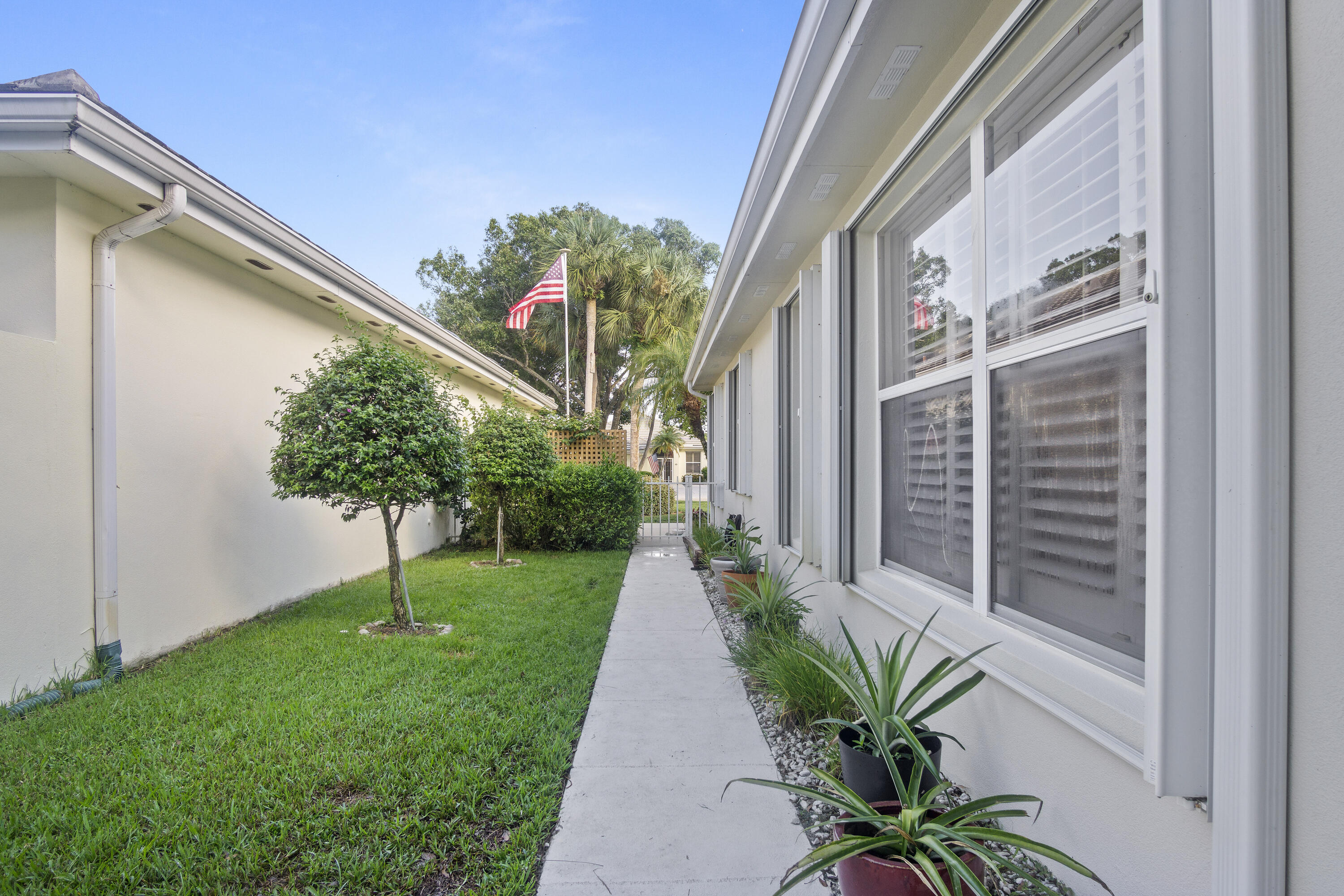 4974 Southeast Inkwood Way Hobe Sound, FL 33455 - Photo 28 of 35 14C Side Yard