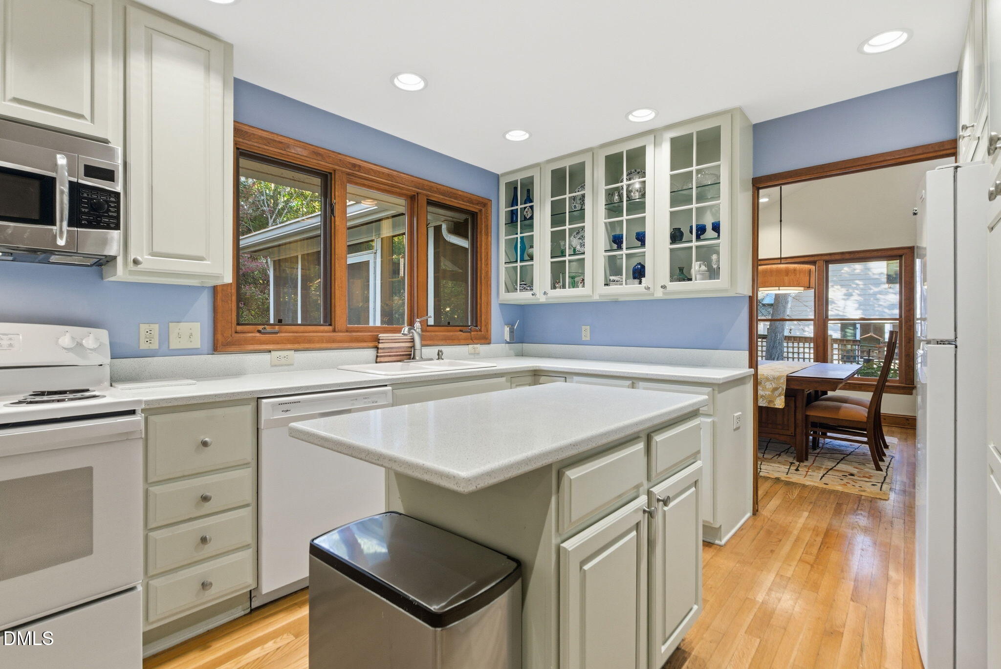 1513 Dellwood Drive Raleigh, NC 27607 - Photo 15 of 76 a kitchen with a stove and a sink