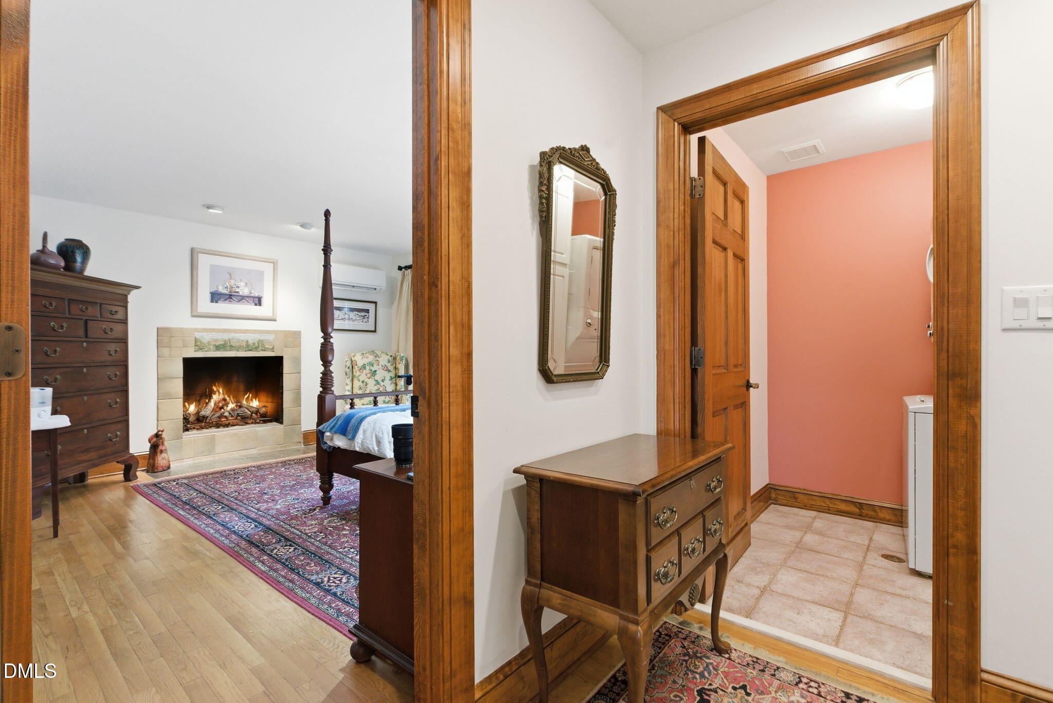 1513 Dellwood Drive Raleigh, NC 27607 - Photo 20 of 76 a living room with furniture a fireplace and a table