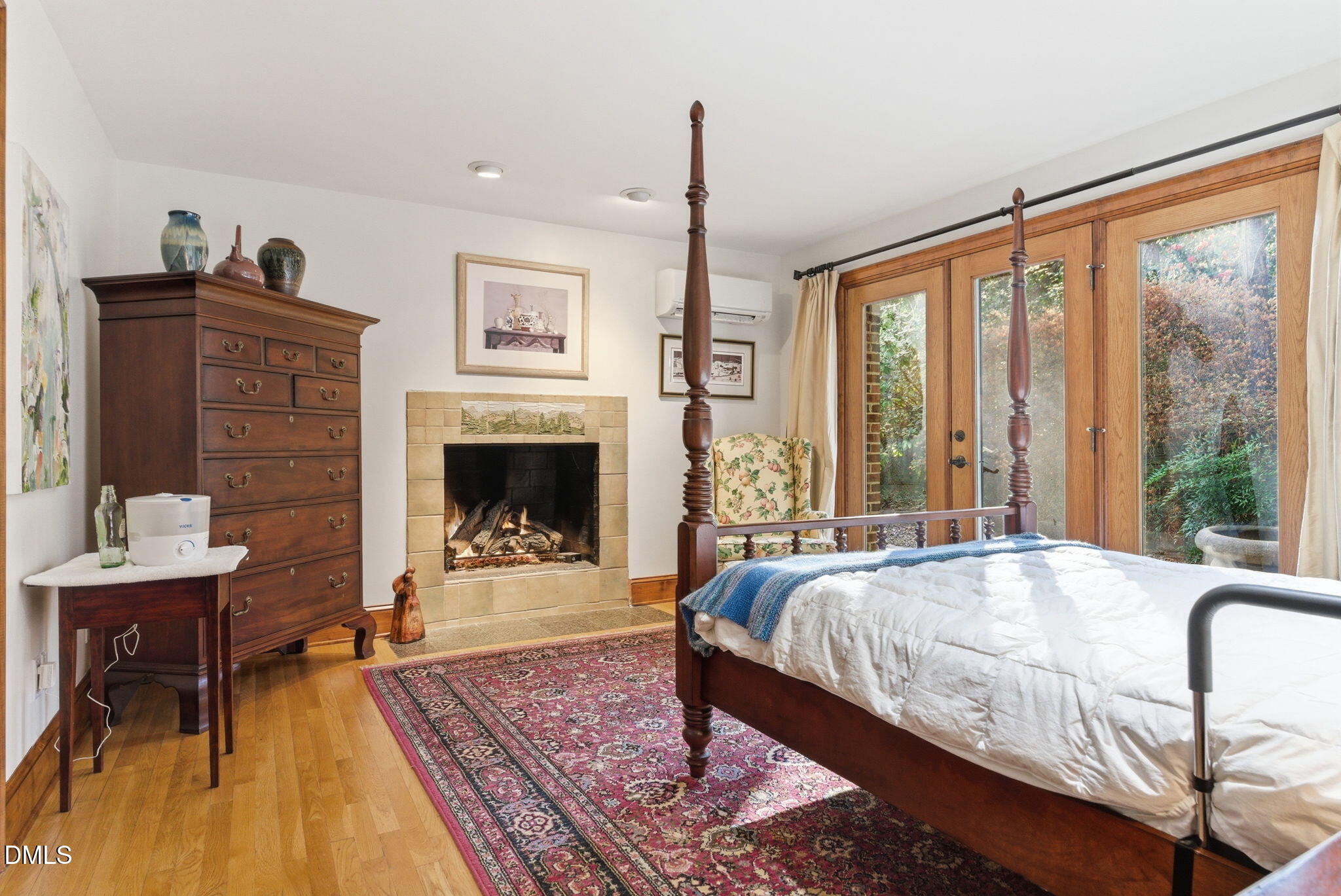 1513 Dellwood Drive Raleigh, NC 27607 - Photo 21 of 76 a bed sitting in a spacious bedroom next to a window
