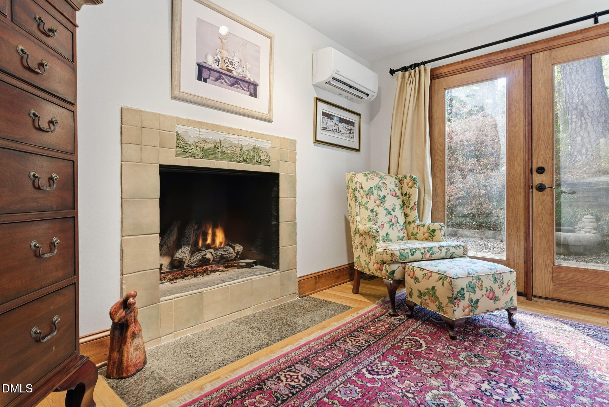 1513 Dellwood Drive Raleigh, NC 27607 - Photo 23 of 76 a living room with furniture and a fireplace