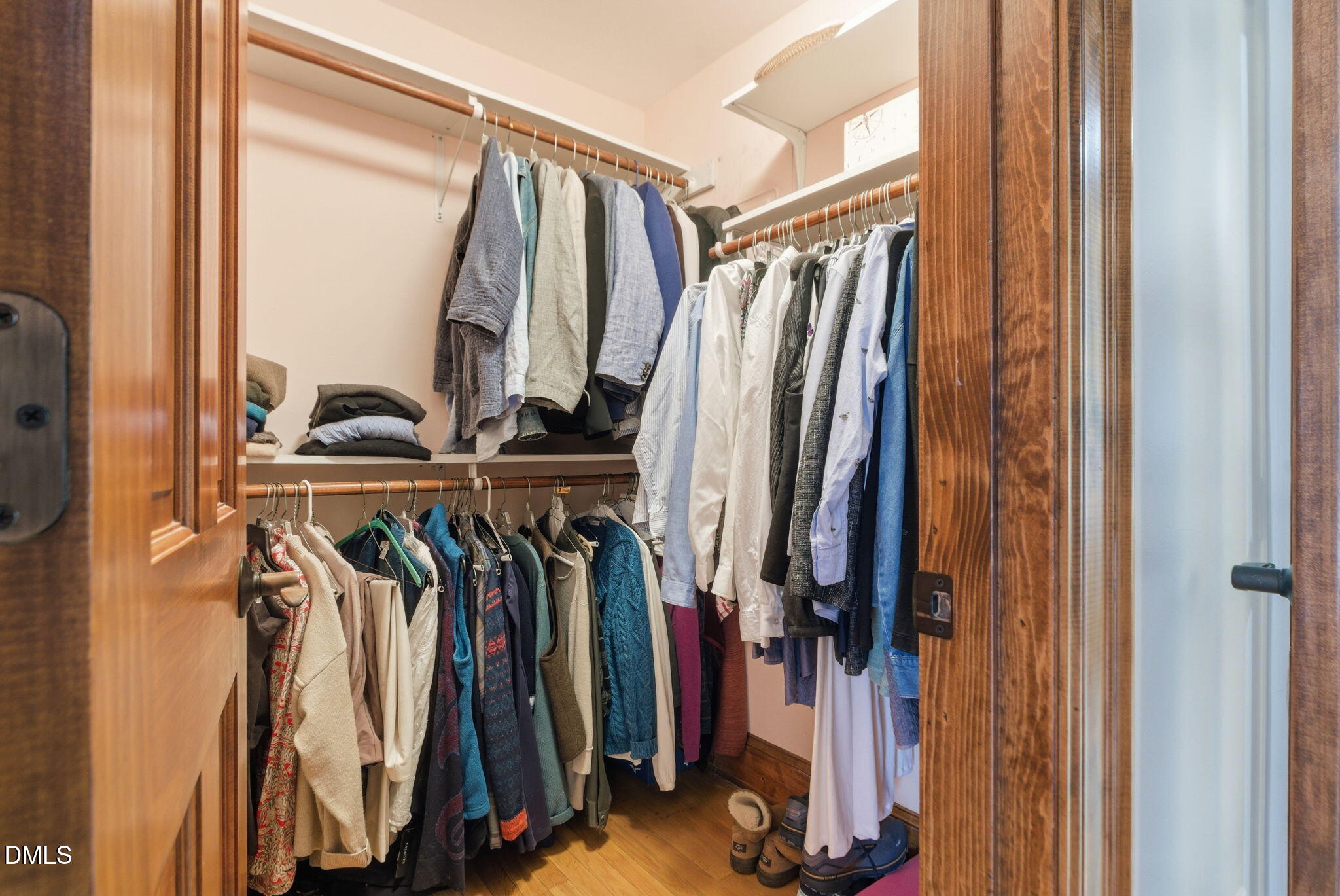 1513 Dellwood Drive Raleigh, NC 27607 - Photo 25 of 76 a view of walk in closet with clothes