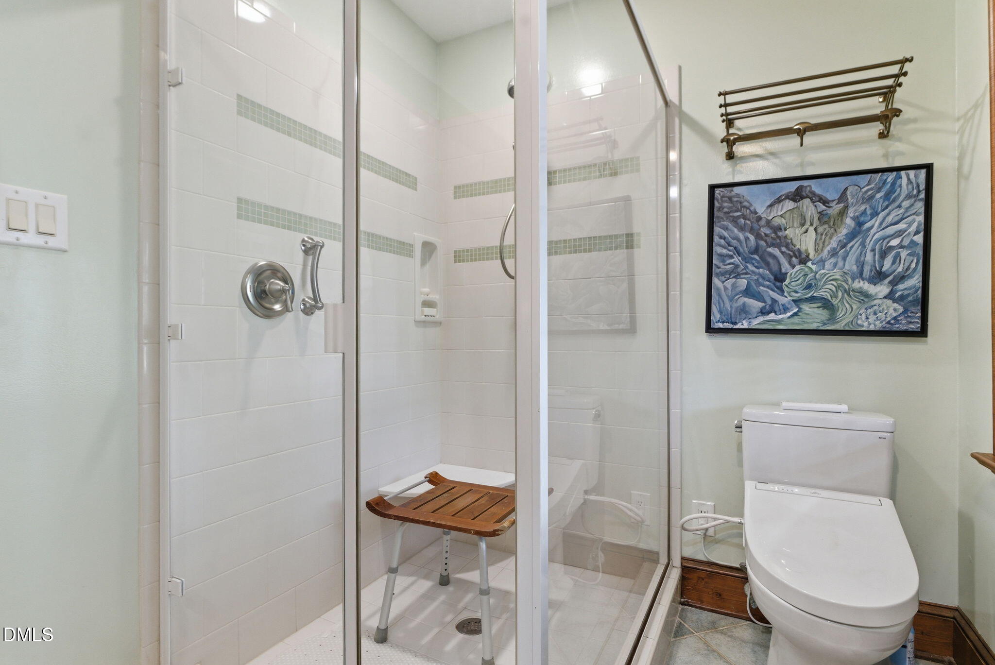 1513 Dellwood Drive Raleigh, NC 27607 - Photo 30 of 76 a bathroom with a toilet and a shower