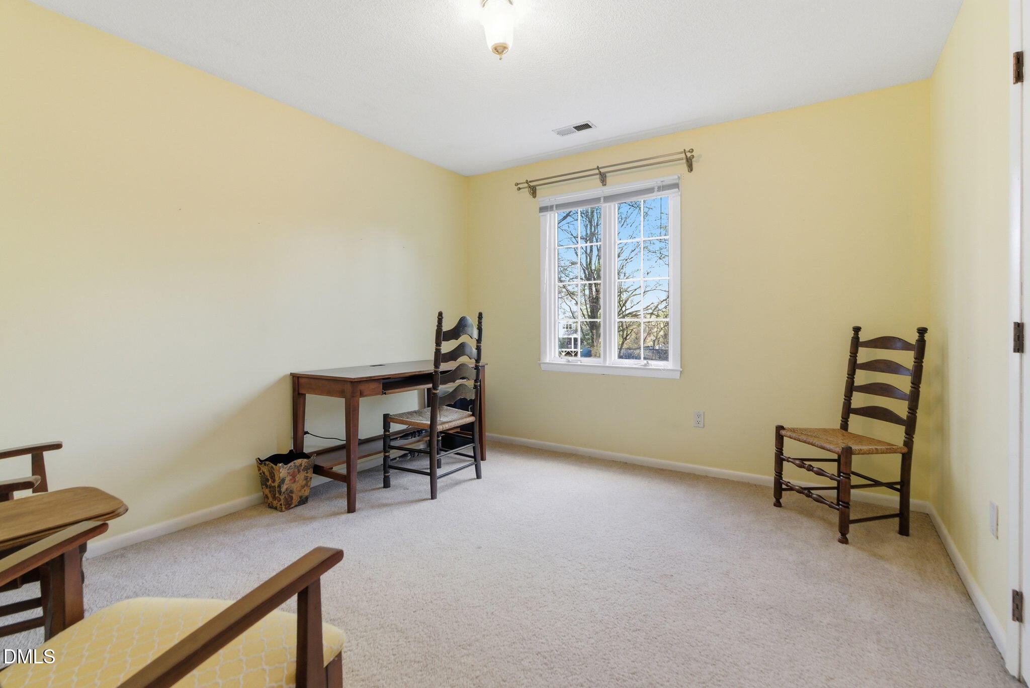 1513 Dellwood Drive Raleigh, NC 27607 - Photo 40 of 76 a view of a workspace with furniture and a window