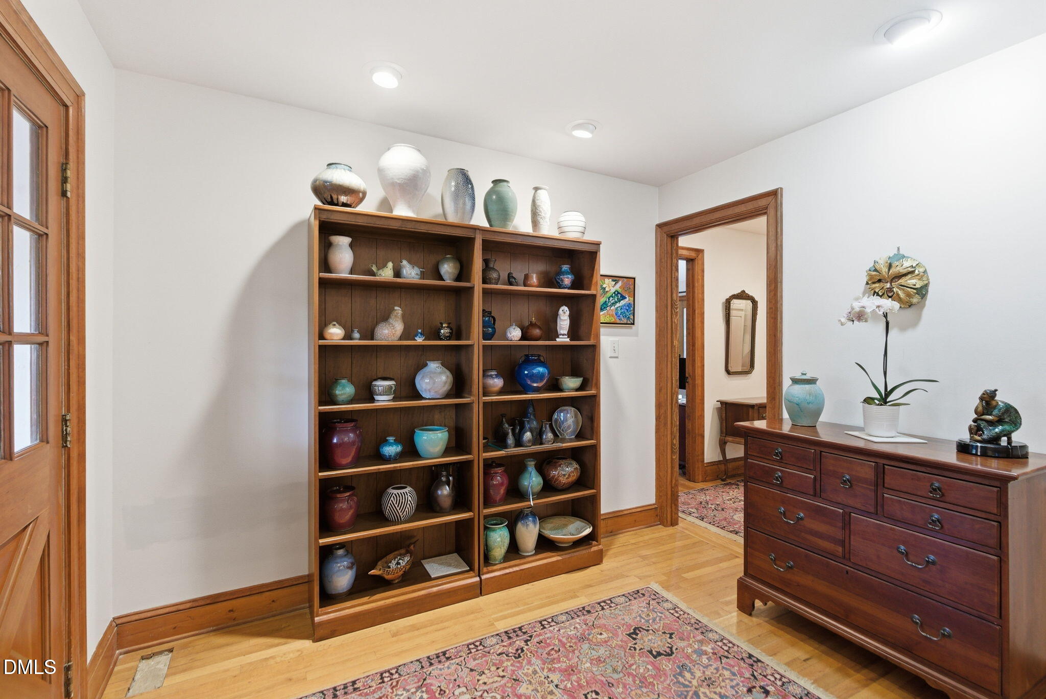1513 Dellwood Drive Raleigh, NC 27607 - Photo 4 of 76 a view of walk in closet with clothes and shoes