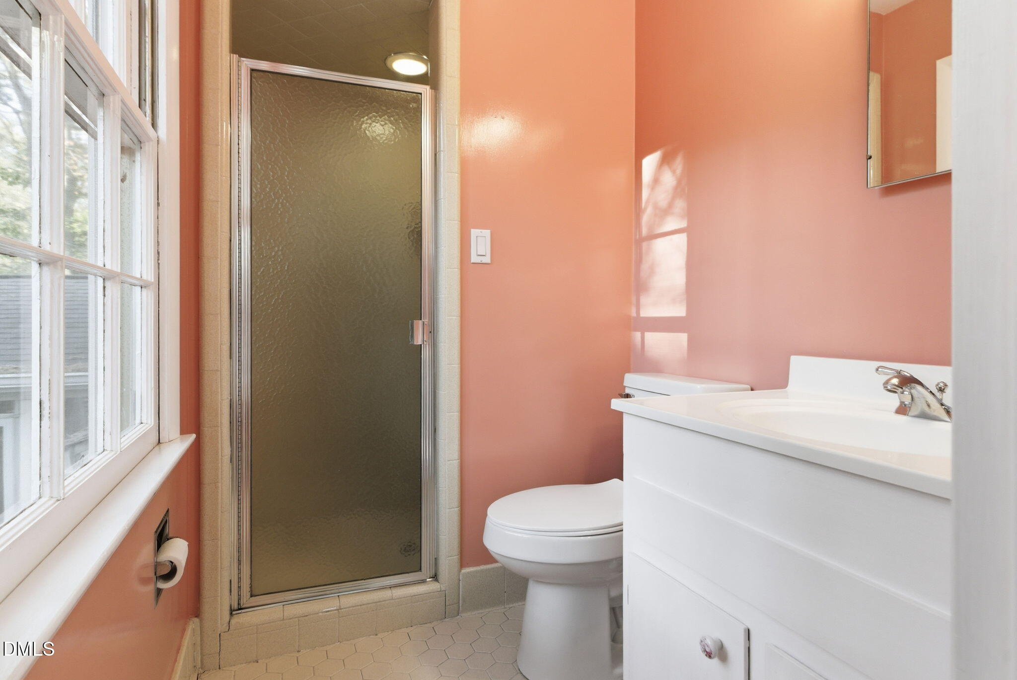 1513 Dellwood Drive Raleigh, NC 27607 - Photo 51 of 76 a bathroom with a sink a toilet and shower