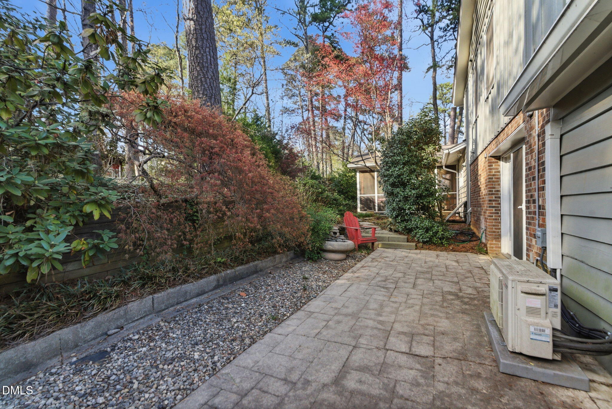 1513 Dellwood Drive Raleigh, NC 27607 - Photo 56 of 76 a view of a pathway with a house in the background