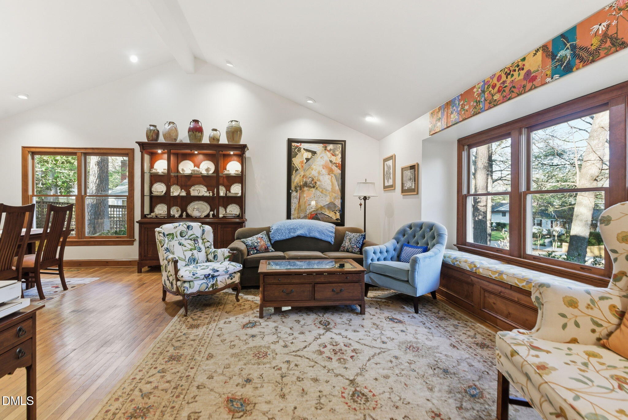 1513 Dellwood Drive Raleigh, NC 27607 - Photo 6 of 76 a living room with furniture and a large window