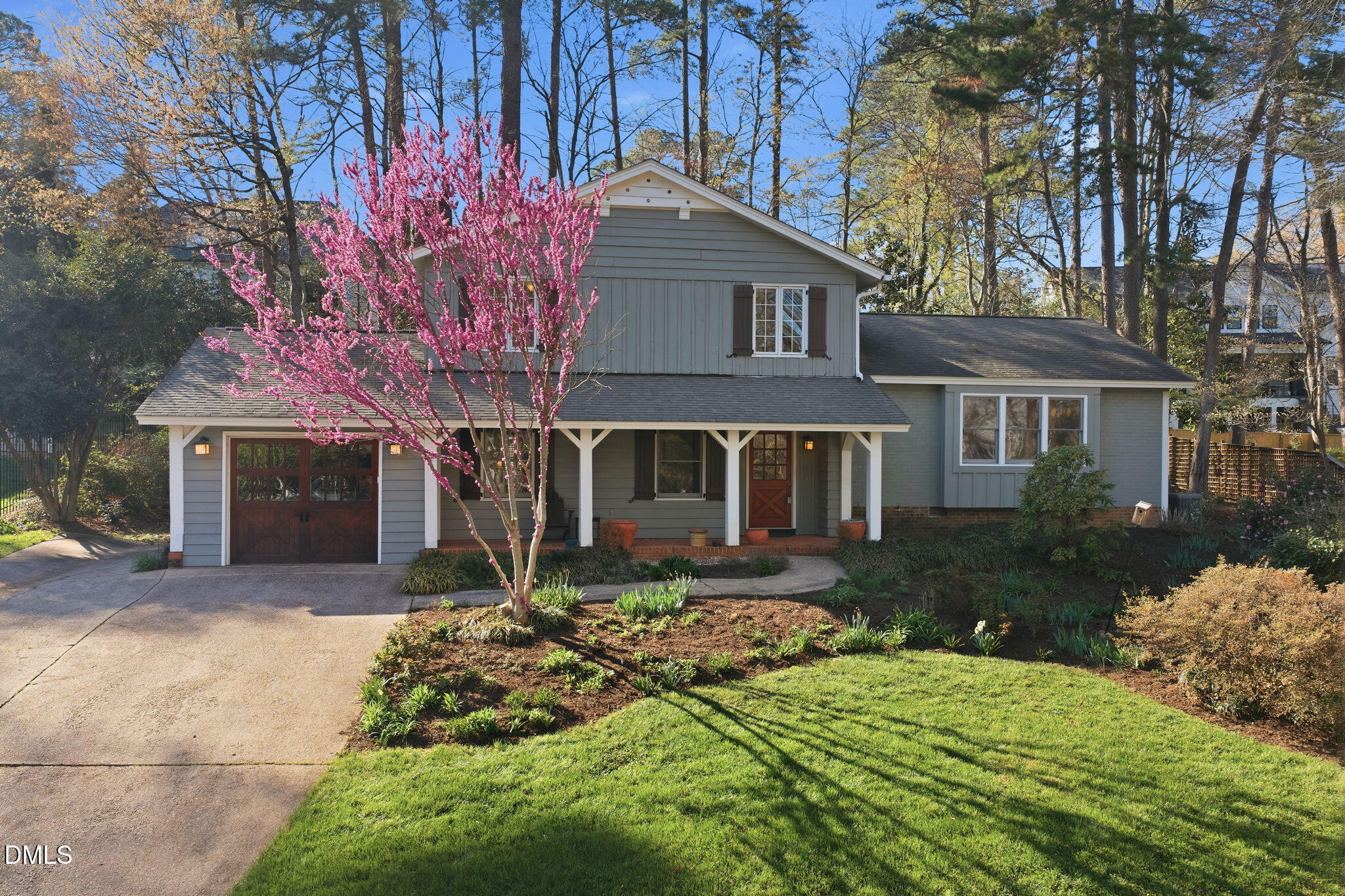 1513 Dellwood Drive Raleigh, NC 27607 - Photo 64 of 76 a front view of a house with garden
