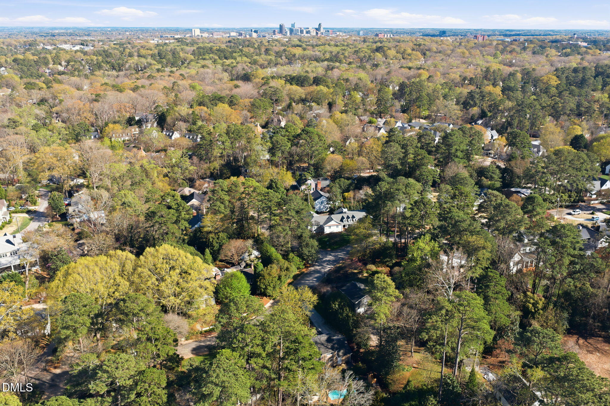 1513 Dellwood Drive Raleigh, NC 27607 - Photo 71 of 76 an aerial view of a houses with a yard