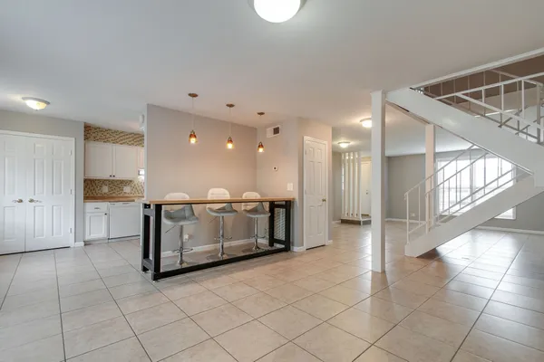 a view of kitchen with furniture and window