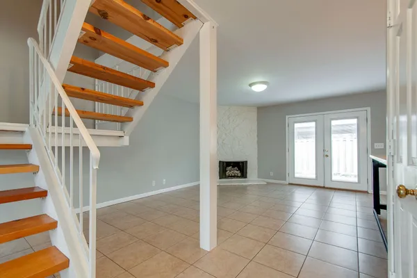 a view of an entryway with staircase