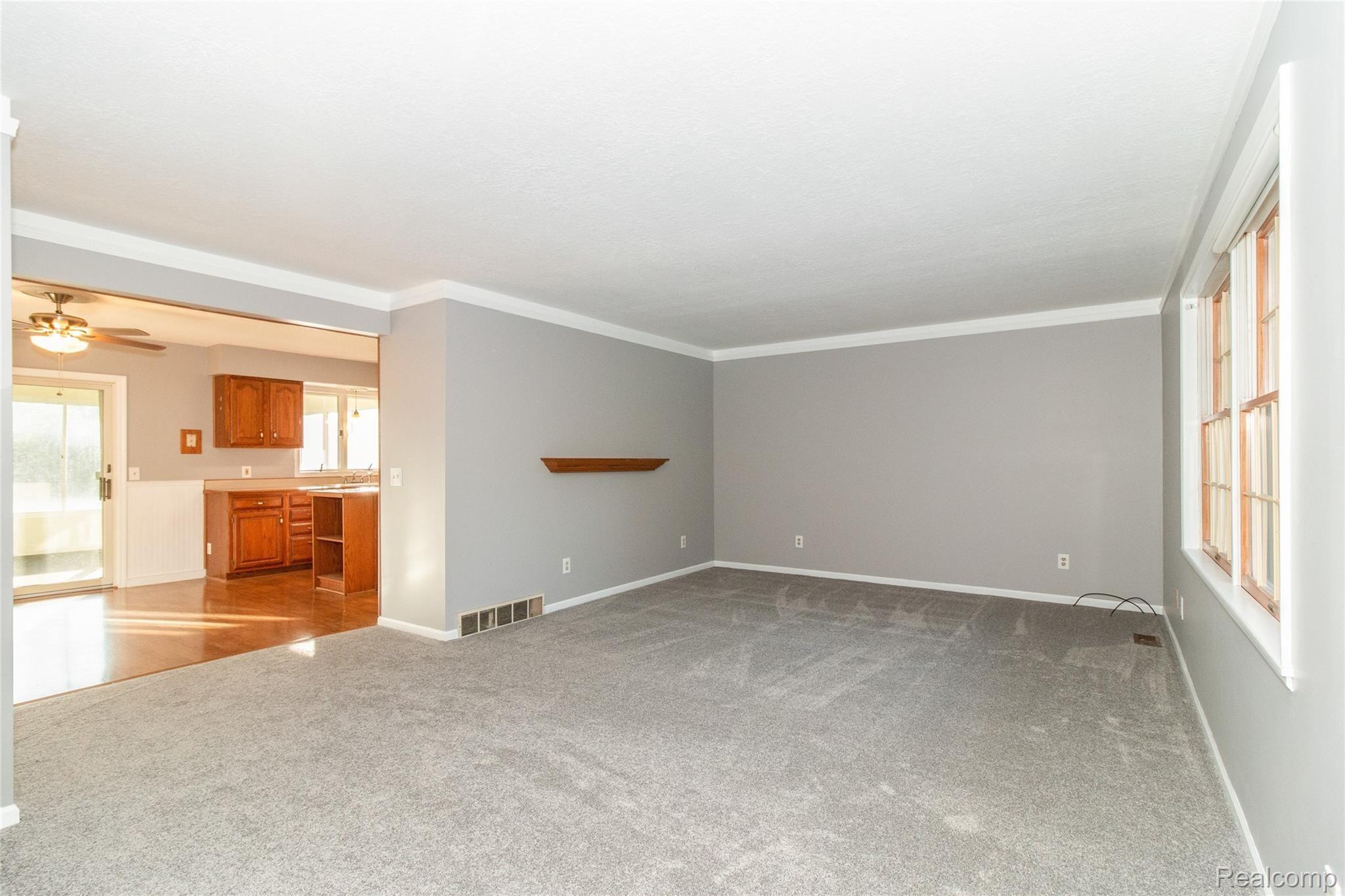 Living room is open to the dining area and kitchen