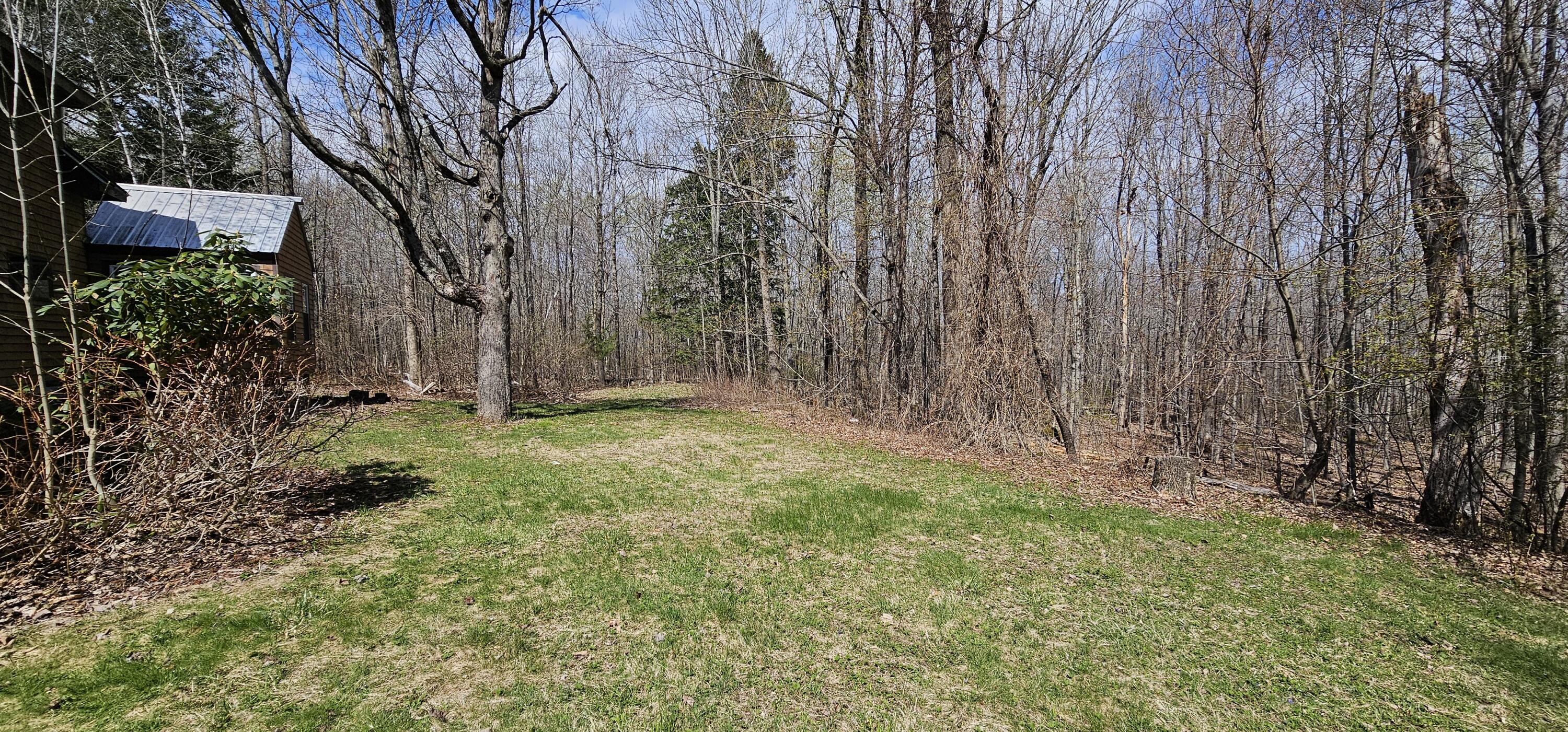 508 Mile Hill Road New Sharon, ME 04955 - Photo 7 of 37 08. Backyardjpg