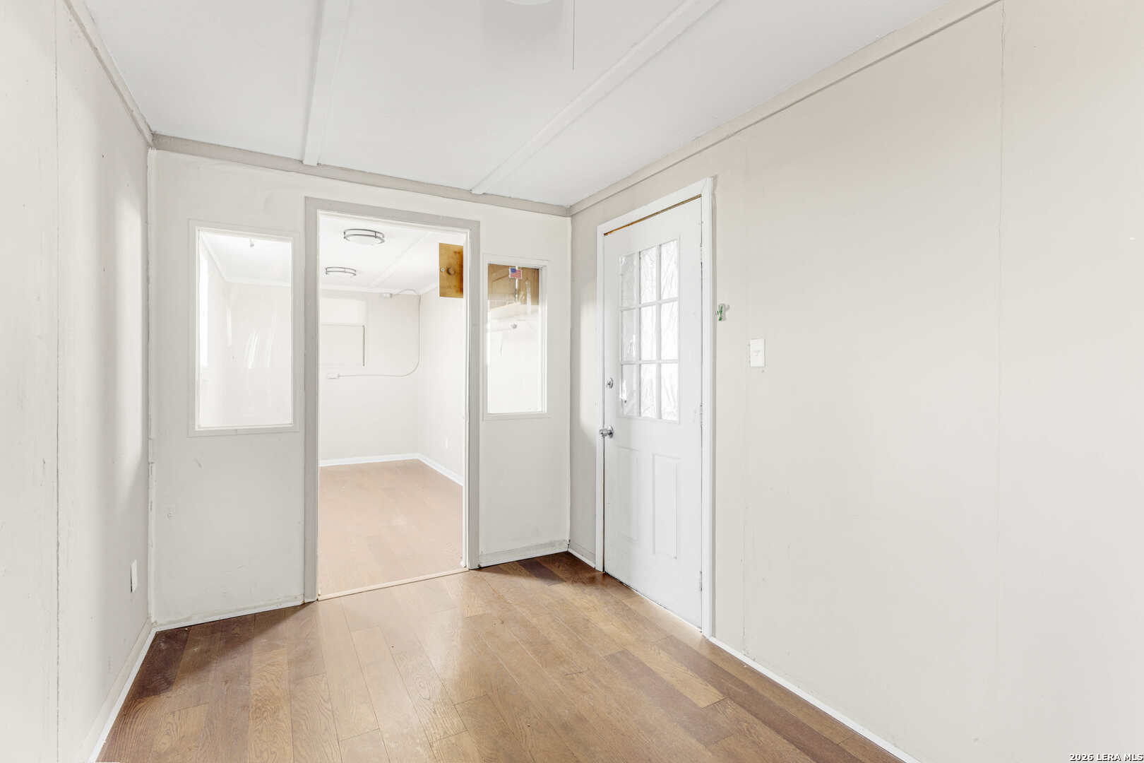 2811 County Road 467 Devine, TX 78016 - Photo 14 of 28 a view of an empty room with closet and a window