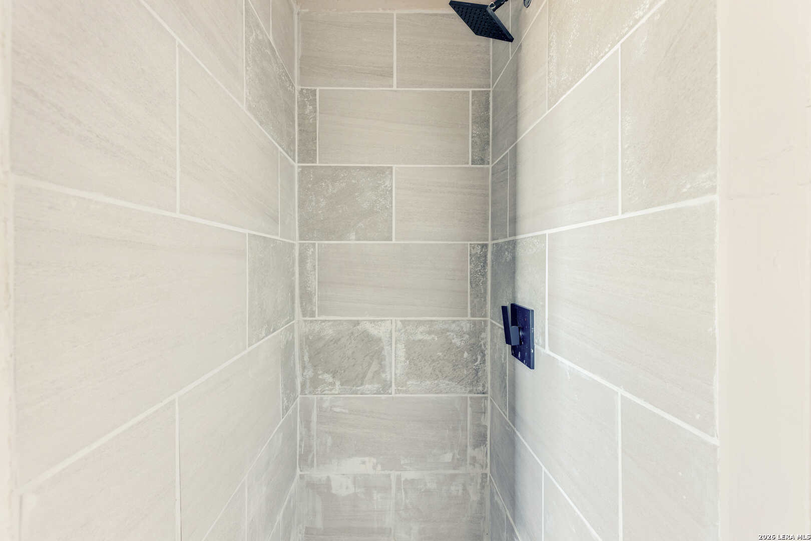 2811 County Road 467 Devine, TX 78016 - Photo 27 of 28 a bathroom with a shower