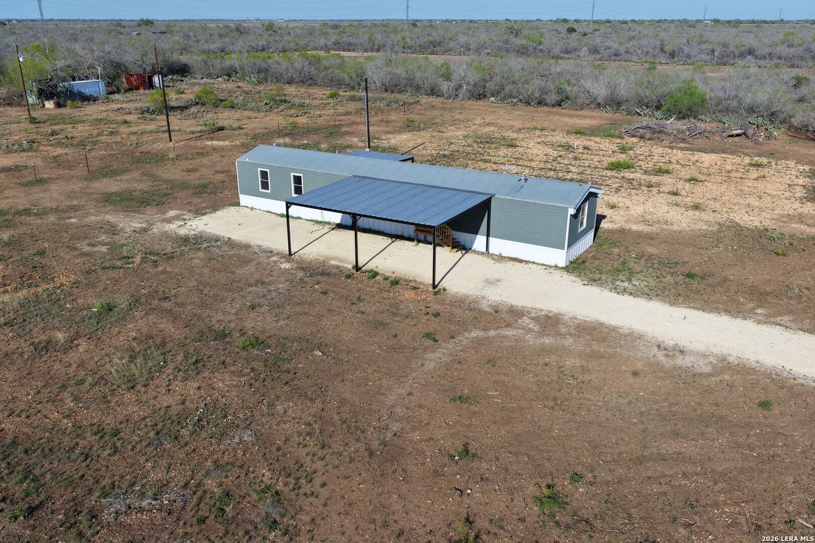 2811 County Road 467 Devine, TX 78016 - Photo 5 of 28 a view of a yard with a yard