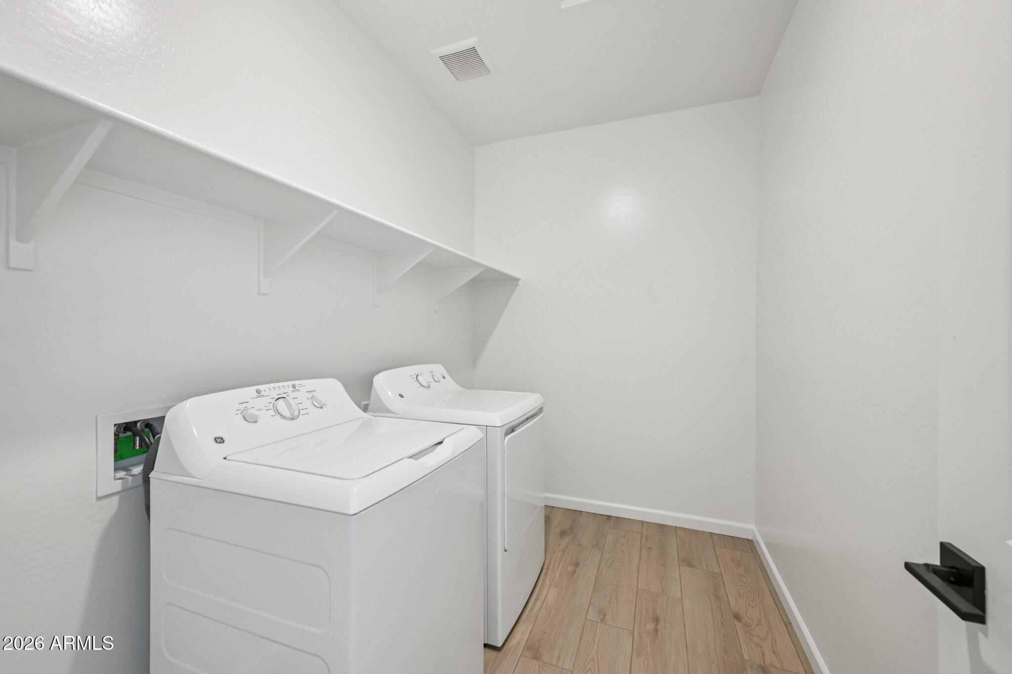16206 West Red Bird Road Surprise, AZ 85387 - Photo 19 of 35 a utility room with dryer and washer