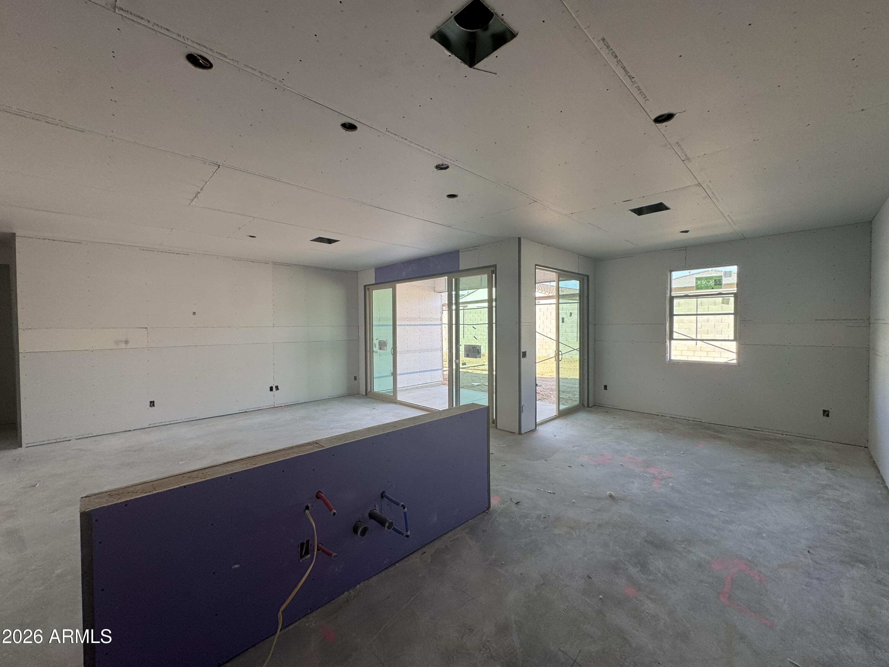 16206 West Red Bird Road Surprise, AZ 85387 - Photo 8 of 17 a view of an empty room with a window