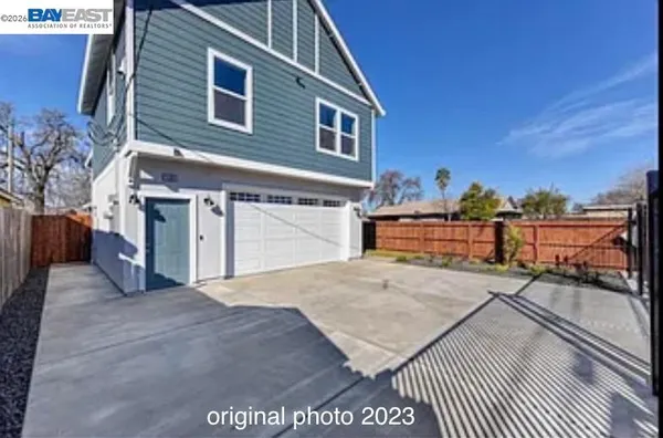 a view of a house with a patio
