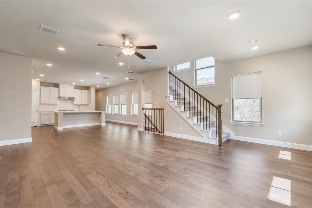 801 Cassandra Court Euless, TX 76040 - Photo 15 of 36 a view of empty room with wooden floor