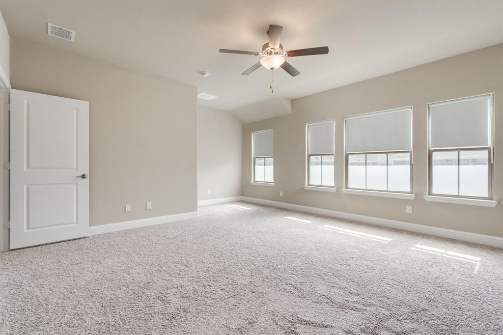 801 Cassandra Court Euless, TX 76040 - Photo 27 of 36 a view of an empty room with a window