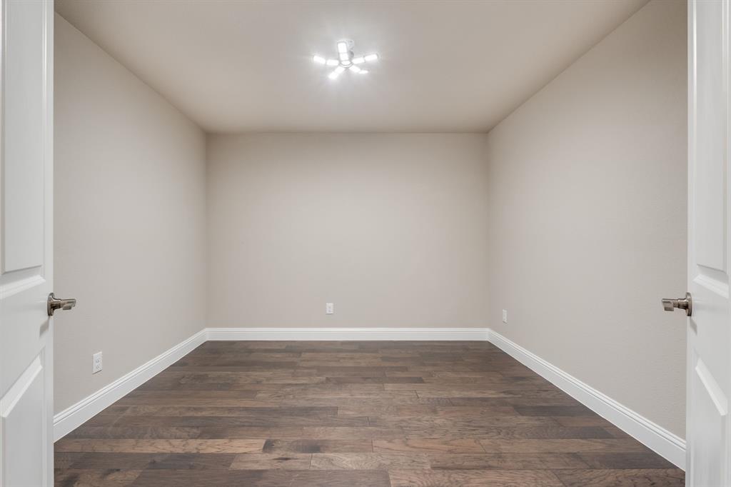 801 Cassandra Court Euless, TX 76040 - Photo 8 of 36 a view of an empty room