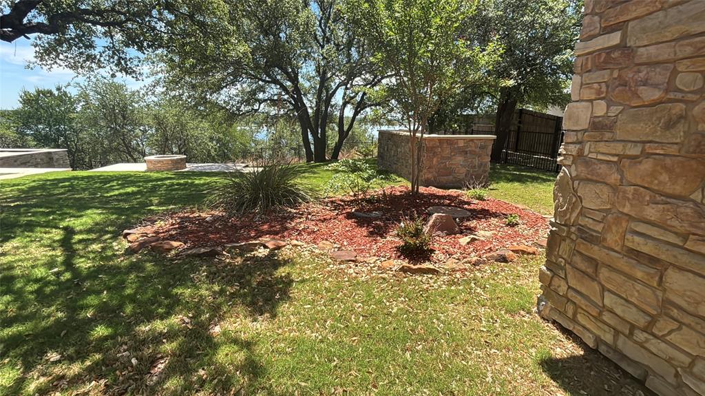 600 Oak Point Drive May, TX 76857 - Photo 21 of 35 a backyard of a house with lots of green space