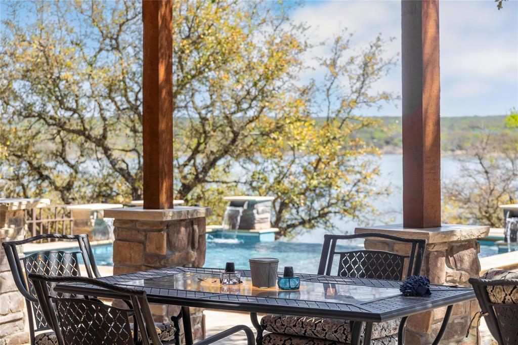 600 Oak Point Drive May, TX 76857 - Photo 23 of 35 a view of balcony with wooden floor and outdoor seating