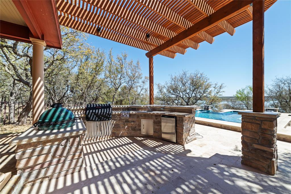 600 Oak Point Drive May, TX 76857 - Photo 25 of 35 a balcony with wooden floor and outdoor seating