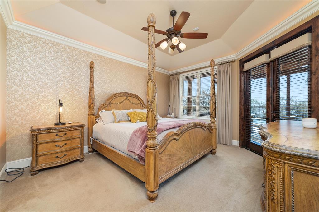 600 Oak Point Drive May, TX 76857 - Photo 32 of 35 a bed sitting in a spacious bedroom next to a window