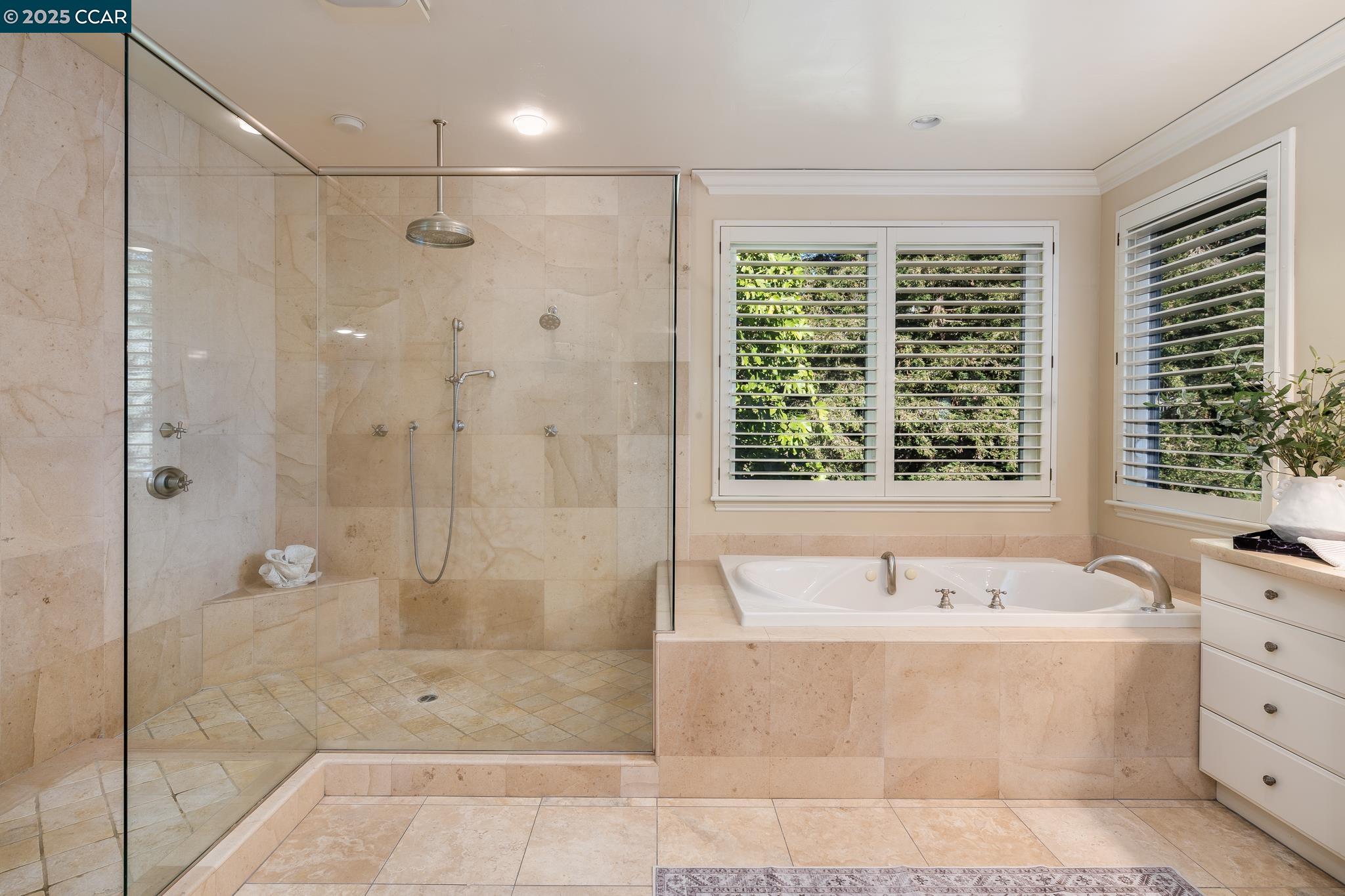 471 El Rio Danville, CA 94526 - Photo 27 of 51 a bathroom with a bathtub and a shower