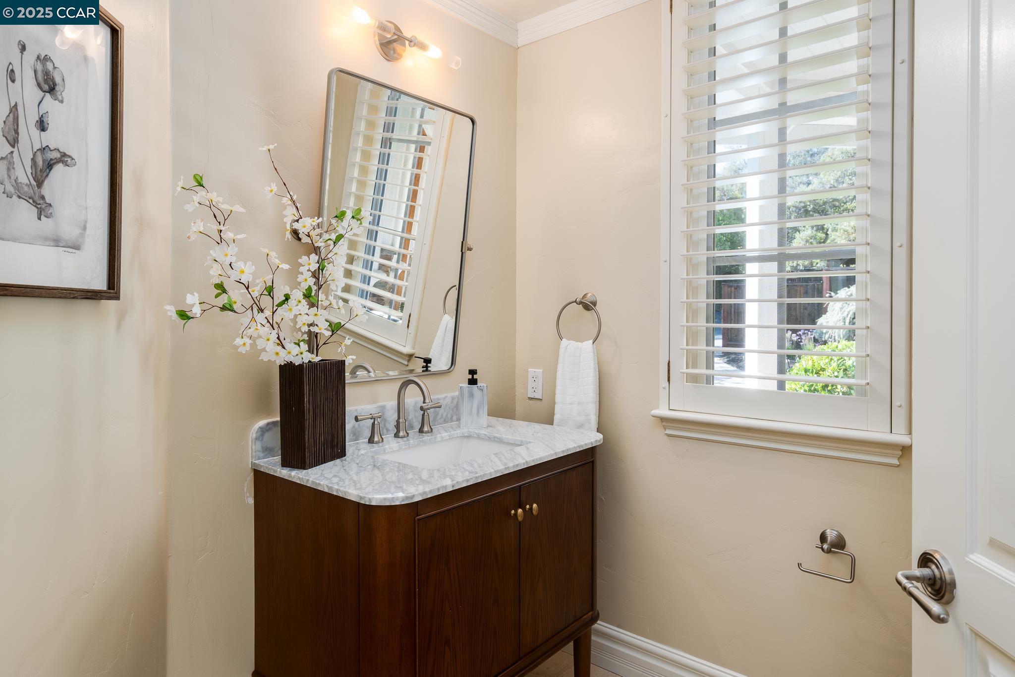 471 El Rio Danville, CA 94526 - Photo 32 of 51 a bathroom with a sink and a mirror