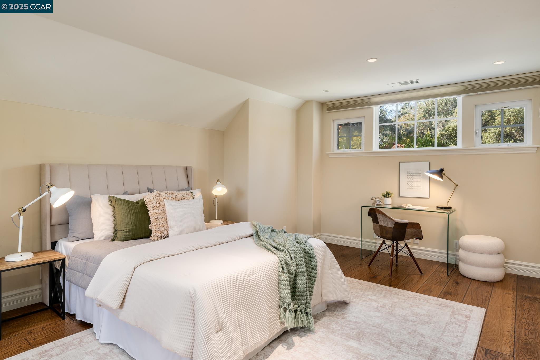 471 El Rio Danville, CA 94526 - Photo 34 of 51 a bedroom with a bed and a large window