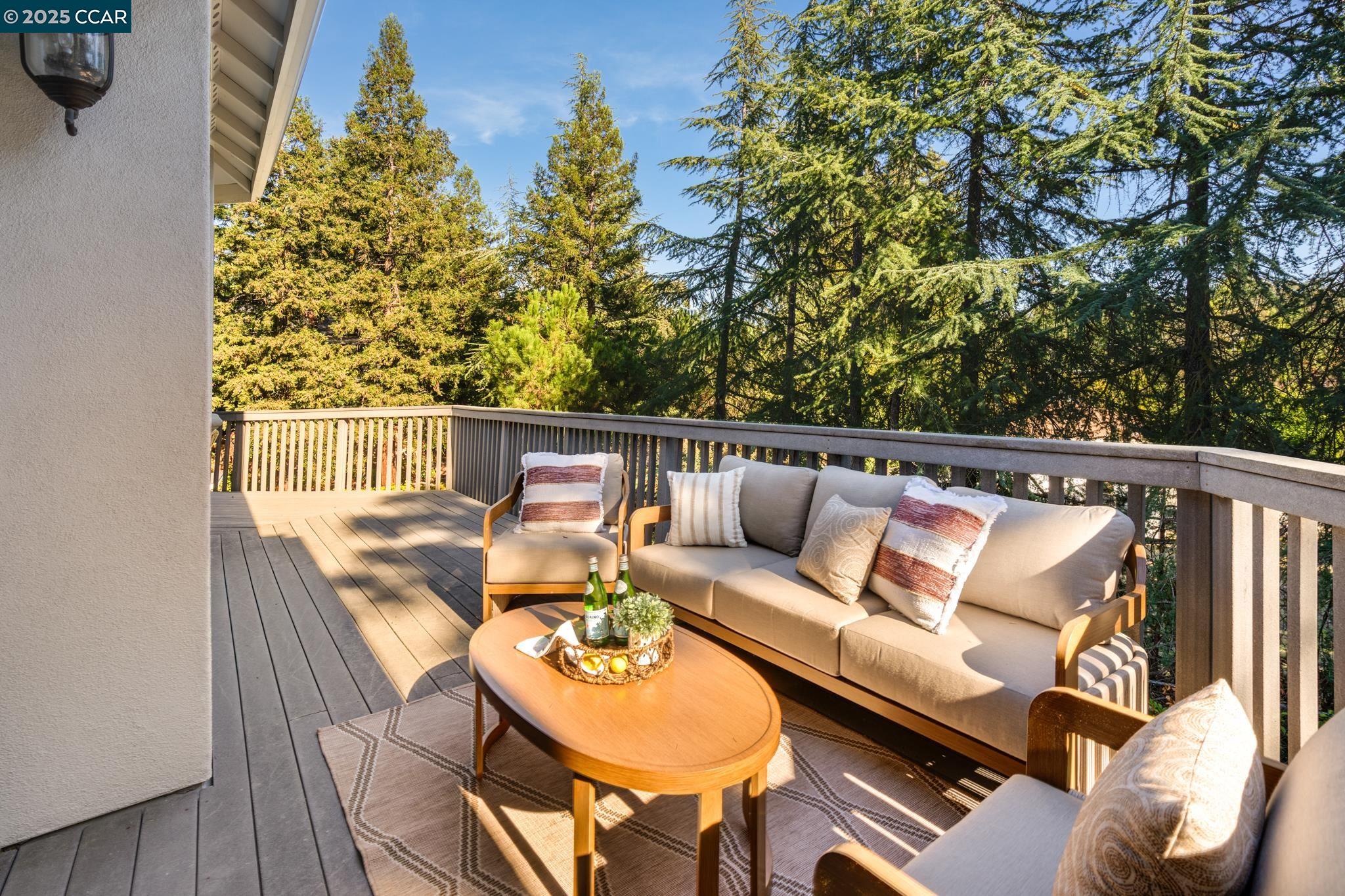 471 El Rio Danville, CA 94526 - Photo 38 of 51 a roof deck with couches and wooden floor